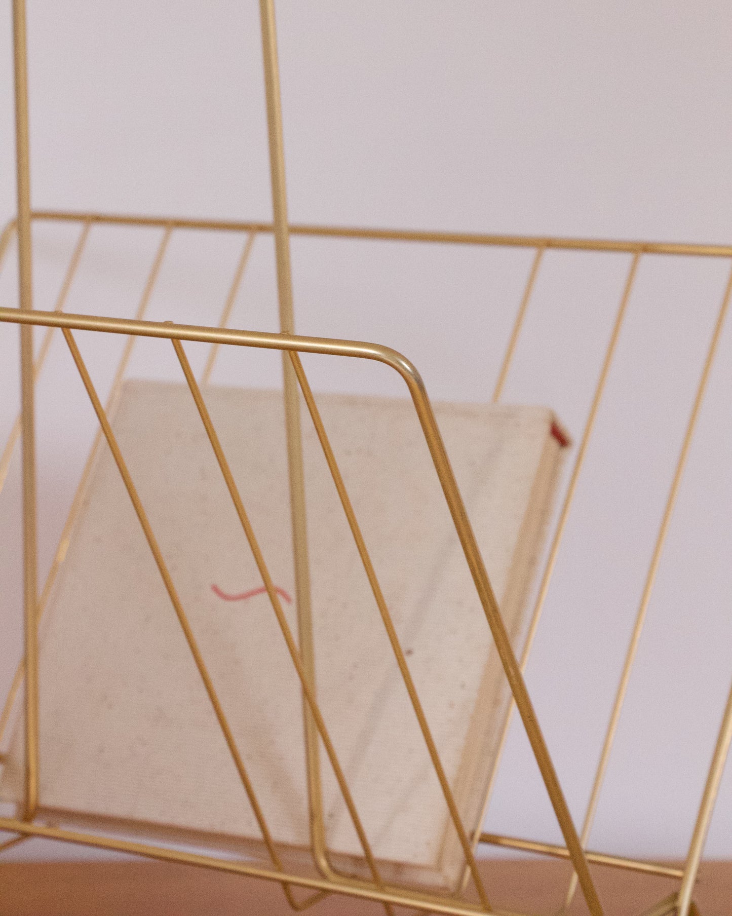 Porte-revues doré vintage