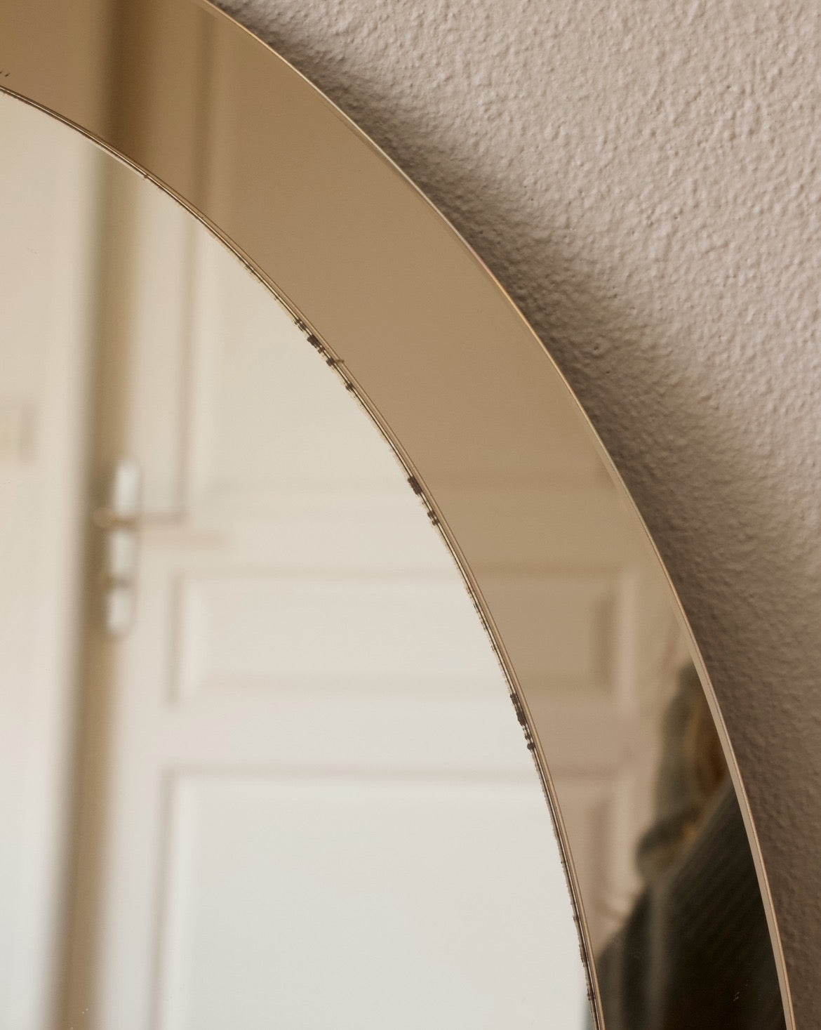 Miroir ovale verre fumé années 70/80